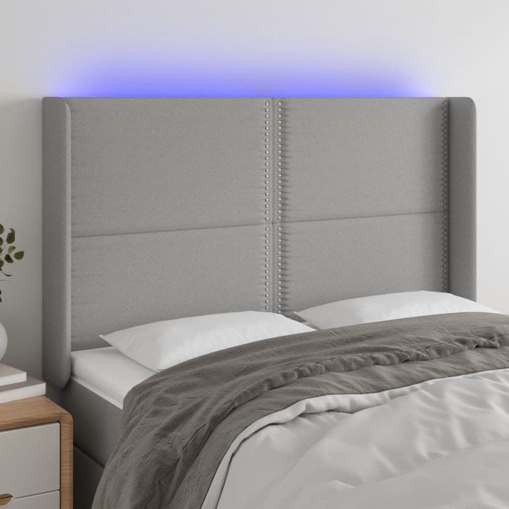 Vidaxl Čelo postele s LED bledosivé 147x16x118/128 cm látka